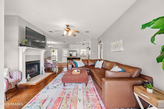 107 Westpointe Cir, Lafayette, LA 70506 - living room featuring a tiled fireplace and ceiling fan