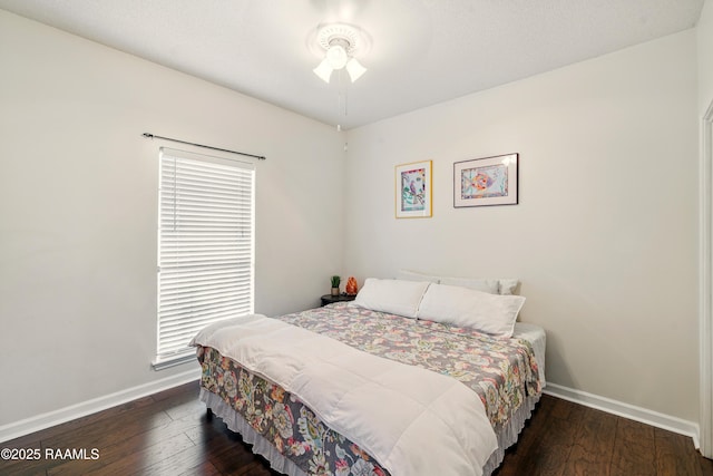 107 Westpointe Cir, Lafayette, LA 70506 - bedroom featuring baseboards, hardwood / wood-style floors, and multiple windows
