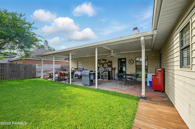 107 Westpointe Cir, Lafayette, LA 70506 - rear view of house with a patio, ceiling fan, and outdoor dining area