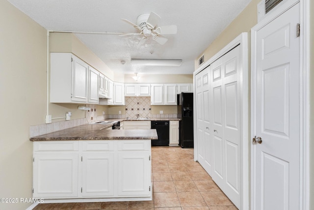 1314 Dulles Dr Unit F, Lafayette, LA 70506 - kitchen with black appliances, ceiling fan, white cabinets, a peninsula, and a textured ceiling