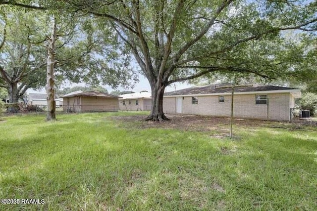 650 Juanita St, Eunice, LA 70535 - view of yard with central AC unit