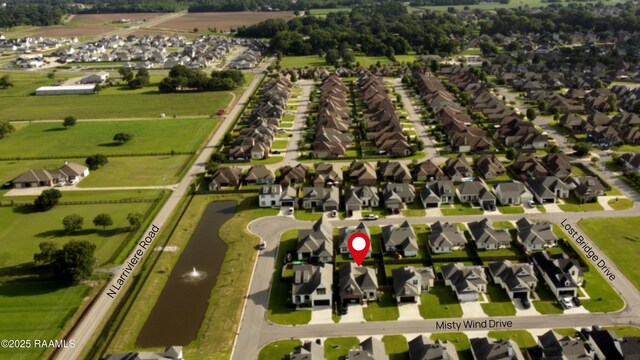 103 Misty Wind Dr, Broussard, LA 70518 - aerial overview of property's location featuring nearby suburban area and a nearby body of water