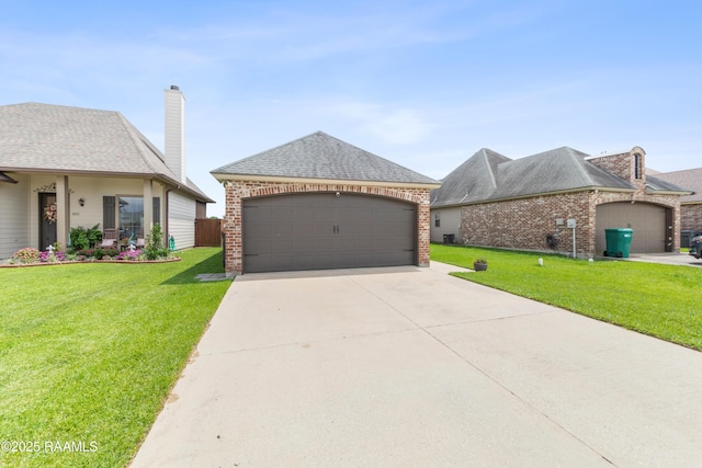 710 Highland View Dr, Youngsville, LA 70592 - french country home with a garage, a front yard, and brick siding