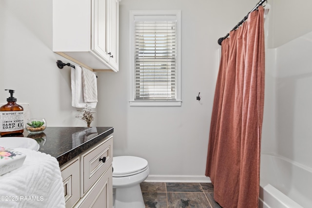 710 Highland View Dr, Youngsville, LA 70592 - full bathroom with baseboards, vanity, toilet, and shower / tub combo