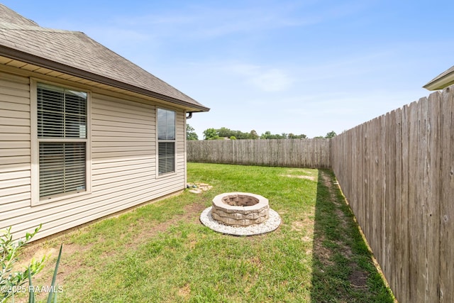 710 Highland View Dr, Youngsville, LA 70592 - view of yard featuring a fire pit