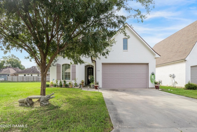 106 Camry Dr, Lafayette, LA 70503 - traditional-style home with concrete driveway and a garage
