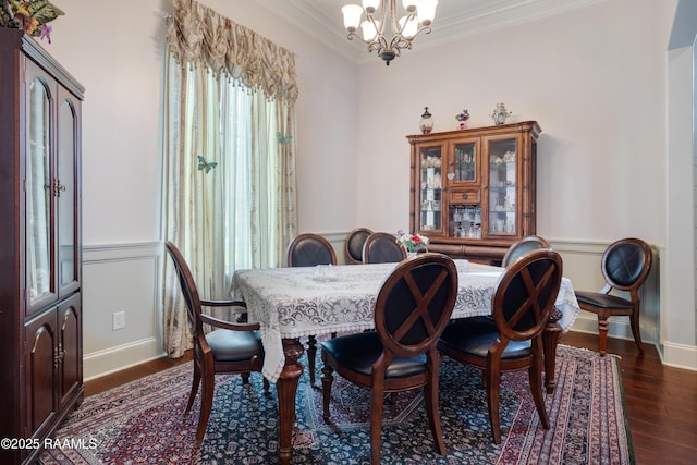 106 Camry Dr, Lafayette, LA 70503 - dining room with a chandelier, ornamental molding, dark wood-style floors, wainscoting, and baseboards