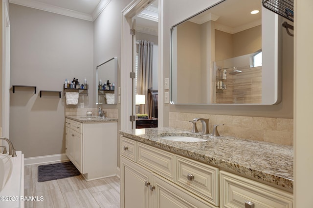 105 Hazy River Way, Lafayette, LA 70508 - full bathroom featuring tasteful backsplash, two vanities, ornamental molding, a tile shower, and recessed lighting