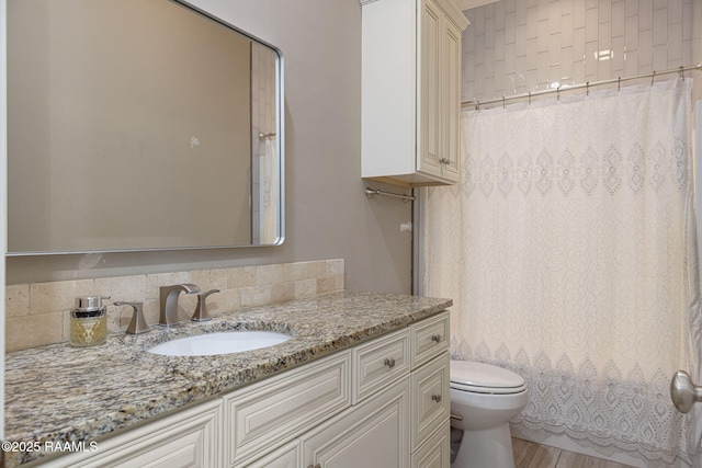 105 Hazy River Way, Lafayette, LA 70508 - full bathroom featuring toilet, vanity, shower / bath combo with shower curtain, and wood finished floors