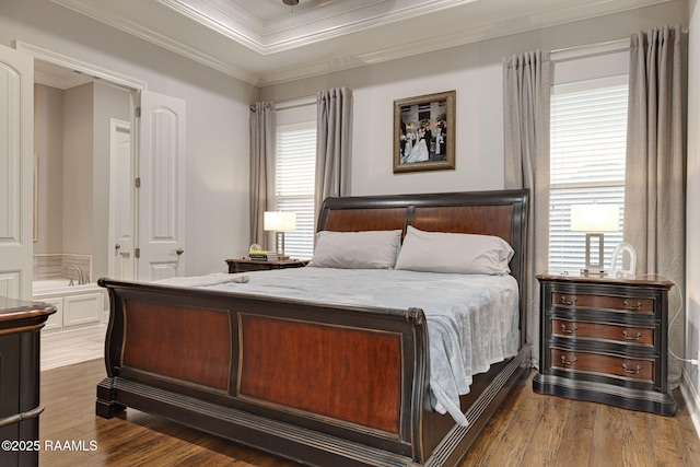 105 Hazy River Way, Lafayette, LA 70508 - bedroom featuring wood finished floors, crown molding, and a tray ceiling