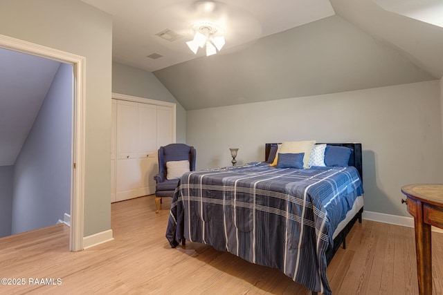 102 Capilano Ln, Broussard, LA 70518 - bedroom with lofted ceiling and light wood finished floors
