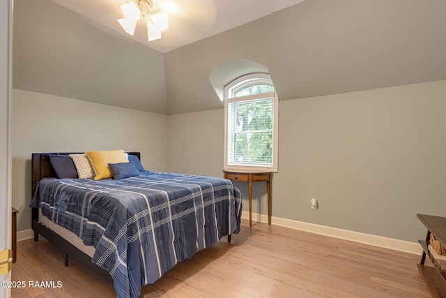 102 Capilano Ln, Broussard, LA 70518 - bedroom with vaulted ceiling, light wood-style floors, and a ceiling fan