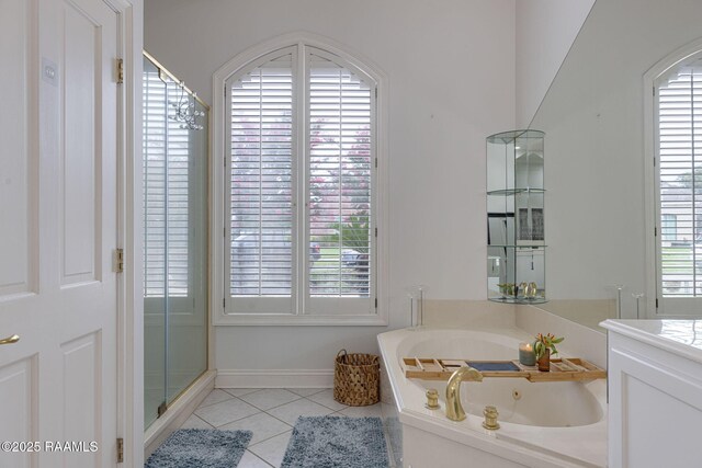 102 Capilano Ln, Broussard, LA 70518 - bathroom with a whirlpool tub, tile patterned flooring, a shower with shower door, and vanity