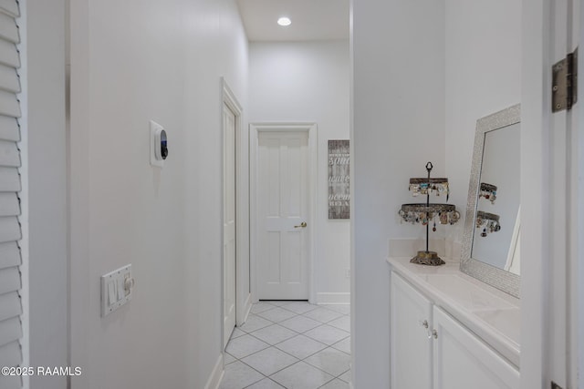 102 Capilano Ln, Broussard, LA 70518 - hallway featuring light tile patterned floors and baseboards
