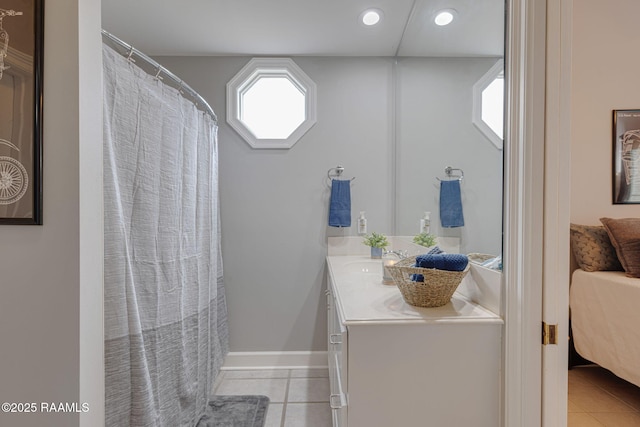 102 Capilano Ln, Broussard, LA 70518 - ensuite bathroom featuring tile patterned flooring, vanity, and recessed lighting