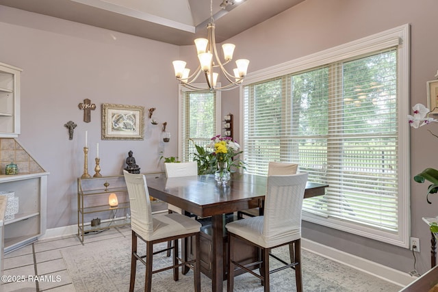 102 Capilano Ln, Broussard, LA 70518 - dining area with a chandelier and light tile patterned floors