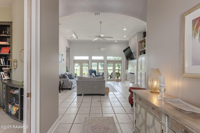 102 Capilano Ln, Broussard, LA 70518 - living room featuring ceiling fan, arched walkways, and recessed lighting