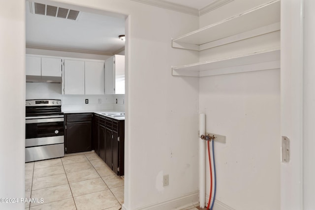 311 Grossie Dr, Lafayette, LA 70501 - kitchen featuring stainless steel electric range, under cabinet range hood, crown molding, light countertops, and light tile patterned flooring