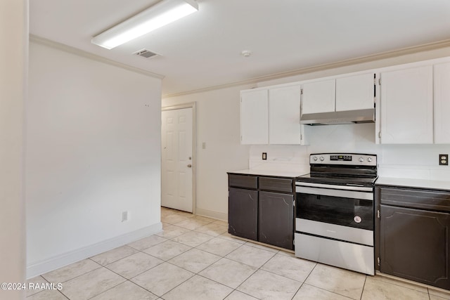 311 Grossie Dr, Lafayette, LA 70501 - kitchen featuring stainless steel electric range, under cabinet range hood, light countertops, ornamental molding, and white cabinetry