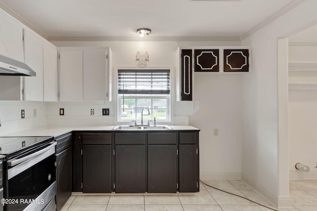 311 Grossie Dr, Lafayette, LA 70501 - kitchen featuring a sink, stainless steel range with electric stovetop, under cabinet range hood, light countertops, and white cabinetry