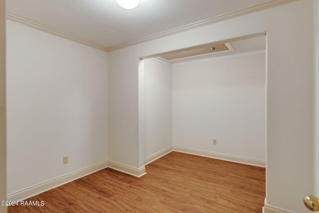 311 Grossie Dr, Lafayette, LA 70501 - empty room with ornamental molding, light wood finished floors, and baseboards