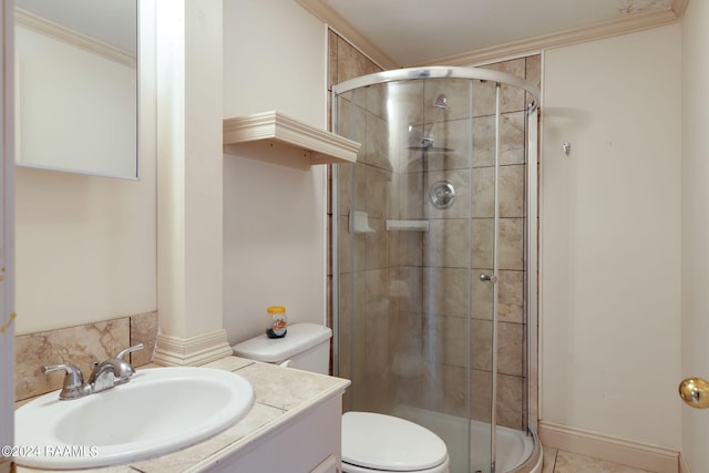 311 Grossie Dr, Lafayette, LA 70501 - bathroom with toilet, a stall shower, vanity, and ornamental molding