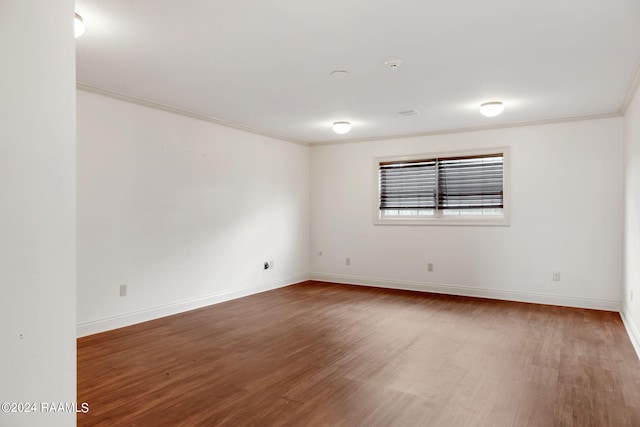 311 Grossie Dr, Lafayette, LA 70501 - spare room with wood finished floors, ornamental molding, baseboards, and a smoke detector