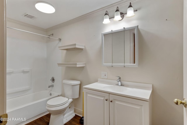 311 Grossie Dr, Lafayette, LA 70501 - bathroom with vanity, toilet, bathtub / shower combination, ornamental molding, and wood finished floors