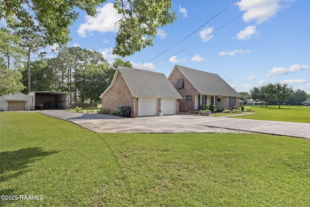 1714 Christopher Fox Ln, New Iberia, LA 70563 - view of front of home with brick siding, a front yard, driveway, a carport, and a shingled roof