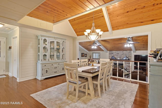 1714 Christopher Fox Ln, New Iberia, LA 70563 - dining room featuring a ceiling fan, wood ceiling, a chandelier, wood finished floors, and lofted ceiling