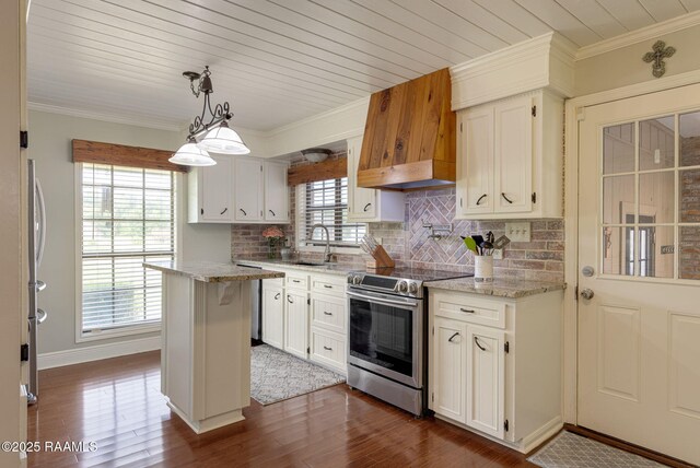1714 Christopher Fox Ln, New Iberia, LA 70563 - kitchen with stainless steel range with electric stovetop, dark wood-style floors, tasteful backsplash, white cabinets, and ornamental molding