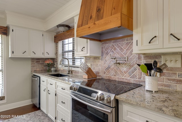 1714 Christopher Fox Ln, New Iberia, LA 70563 - kitchen featuring stainless steel appliances, a sink, crown molding, backsplash, and light stone countertops
