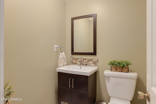 1714 Christopher Fox Ln, New Iberia, LA 70563 - bathroom featuring tasteful backsplash, toilet, and vanity