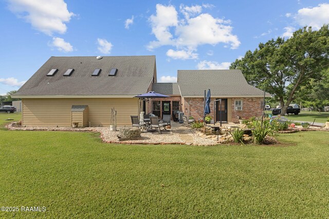 1714 Christopher Fox Ln, New Iberia, LA 70563 - rear view of property featuring a patio and a yard