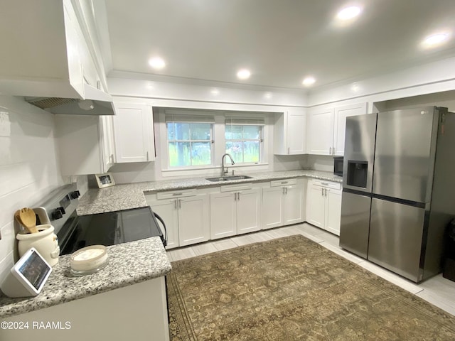 1034 Barras Rd, Saint Martinville, LA 70582 - kitchen featuring stainless steel appliances, a sink, white cabinetry, light stone counters, and recessed lighting