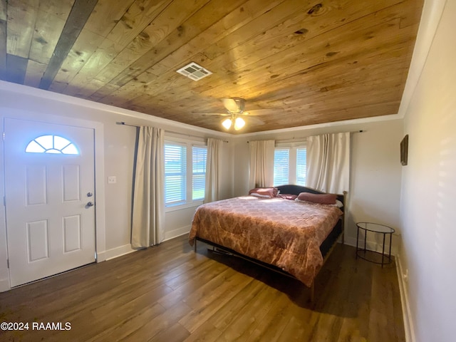 1034 Barras Rd, Saint Martinville, LA 70582 - bedroom featuring wooden ceiling, multiple windows, baseboards, and wood finished floors