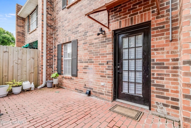 111 Jo Mar Rd, Lafayette, LA 70508 - entrance to property with a patio and brick siding