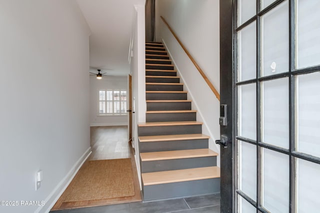 111 Jo Mar Rd, Lafayette, LA 70508 - stairway with tile patterned floors, ceiling fan, and baseboards