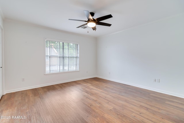 111 Jo Mar Rd, Lafayette, LA 70508 - unfurnished room with ornamental molding, baseboards, ceiling fan, and wood finished floors