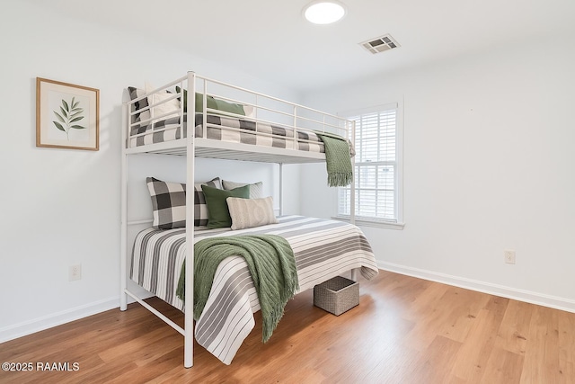 111 Jo Mar Rd, Lafayette, LA 70508 - bedroom featuring wood finished floors and baseboards