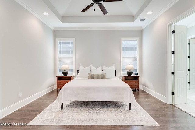 111 San Sebastian Dr, Youngsville, LA 70592 - bedroom featuring baseboards, dark wood finished floors, a raised ceiling, recessed lighting, and ceiling fan