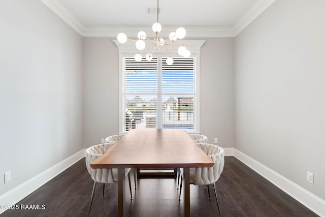 111 San Sebastian Dr, Youngsville, LA 70592 - dining area featuring crown molding, wood finished floors, baseboards, and a chandelier