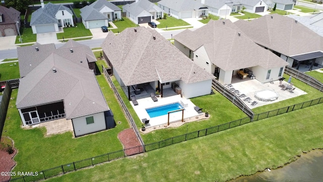 111 San Sebastian Dr, Youngsville, LA 70592 - aerial perspective of suburban area with a pool area