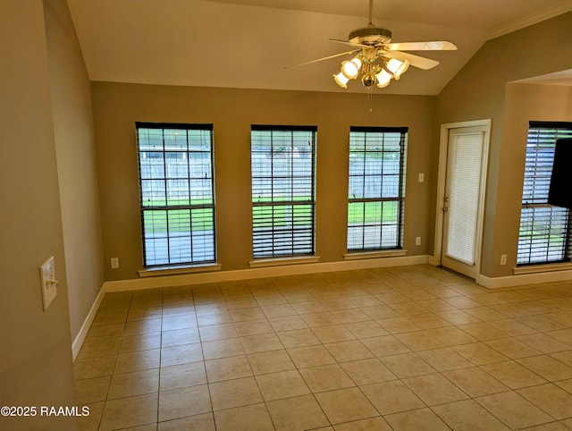 103 E Weeks Dr, Youngsville, LA 70592 - unfurnished room with light tile patterned floors, a ceiling fan, plenty of natural light, lofted ceiling, and baseboards