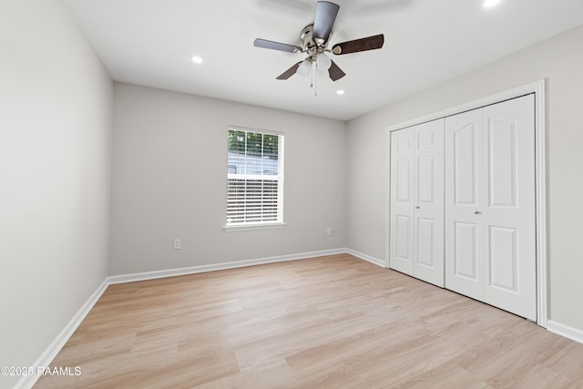 315 Kelso Dr, Carencro, LA 70520 - unfurnished bedroom featuring light wood-style flooring, recessed lighting, a closet, baseboards, and a ceiling fan