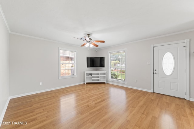 315 Kelso Dr, Carencro, LA 70520 - entrance foyer with crown molding, a ceiling fan, light wood-type flooring, and baseboards