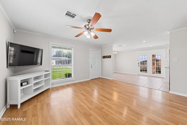 315 Kelso Dr, Carencro, LA 70520 - unfurnished living room with a ceiling fan, crown molding, light wood-type flooring, baseboards, and recessed lighting