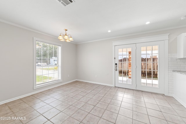 315 Kelso Dr, Carencro, LA 70520 - spare room with a chandelier, light tile patterned floors, ornamental molding, baseboards, and recessed lighting