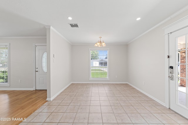 315 Kelso Dr, Carencro, LA 70520 - entryway with a chandelier, ornamental molding, baseboards, recessed lighting, and light tile patterned floors