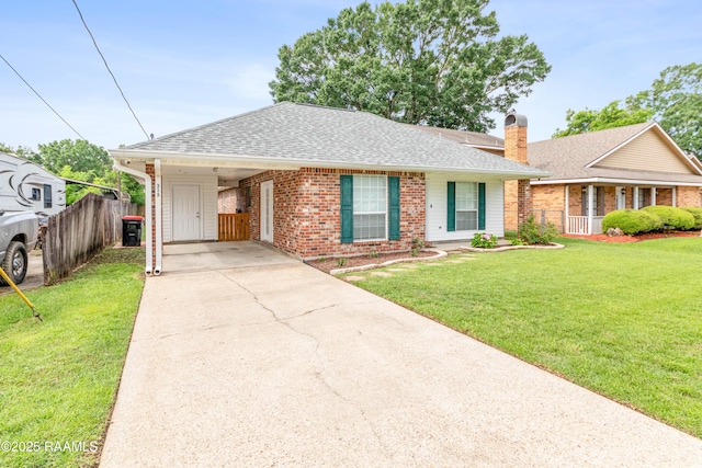 315 Kelso Dr, Carencro, LA 70520 - single story home with brick siding, a shingled roof, a chimney, concrete driveway, and a carport